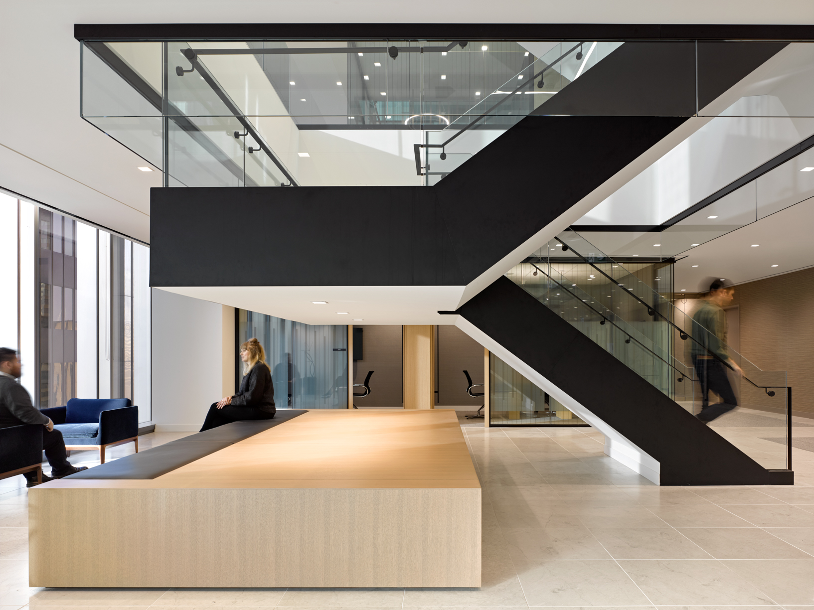 OMERS office modern black staircase with light woods