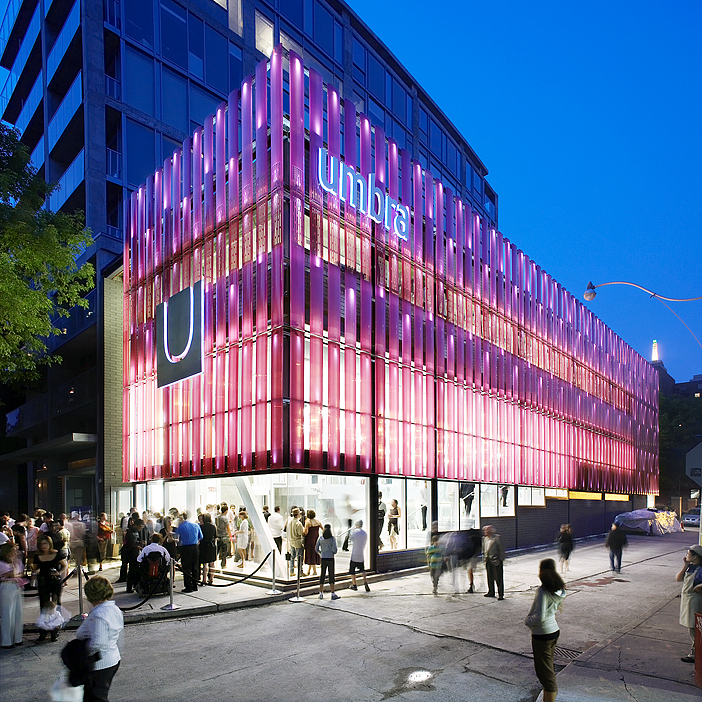 Umbra Toronto exterior with Umbra logo and pink and purple facade