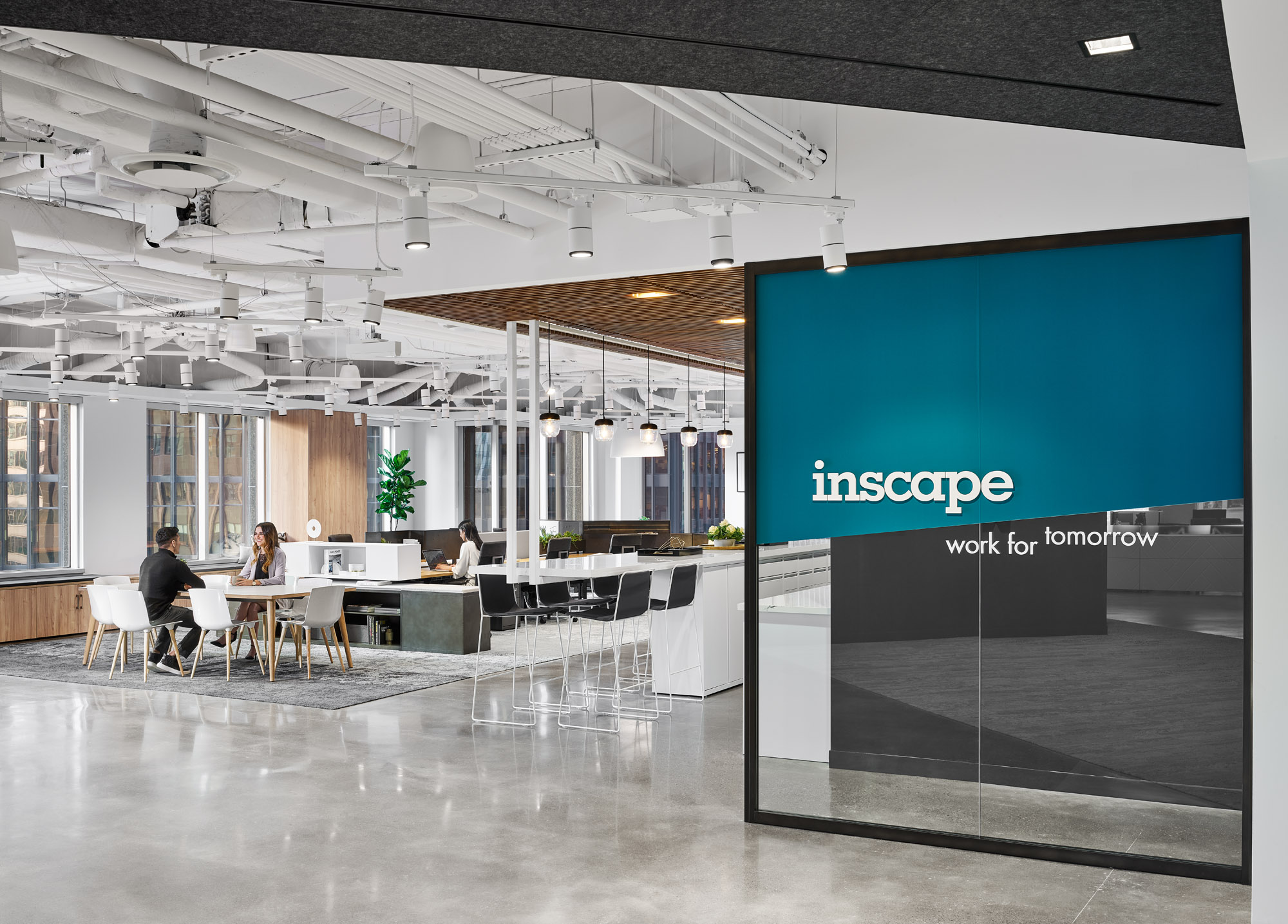 Inscape showroom entrance with glass wall featuring logo