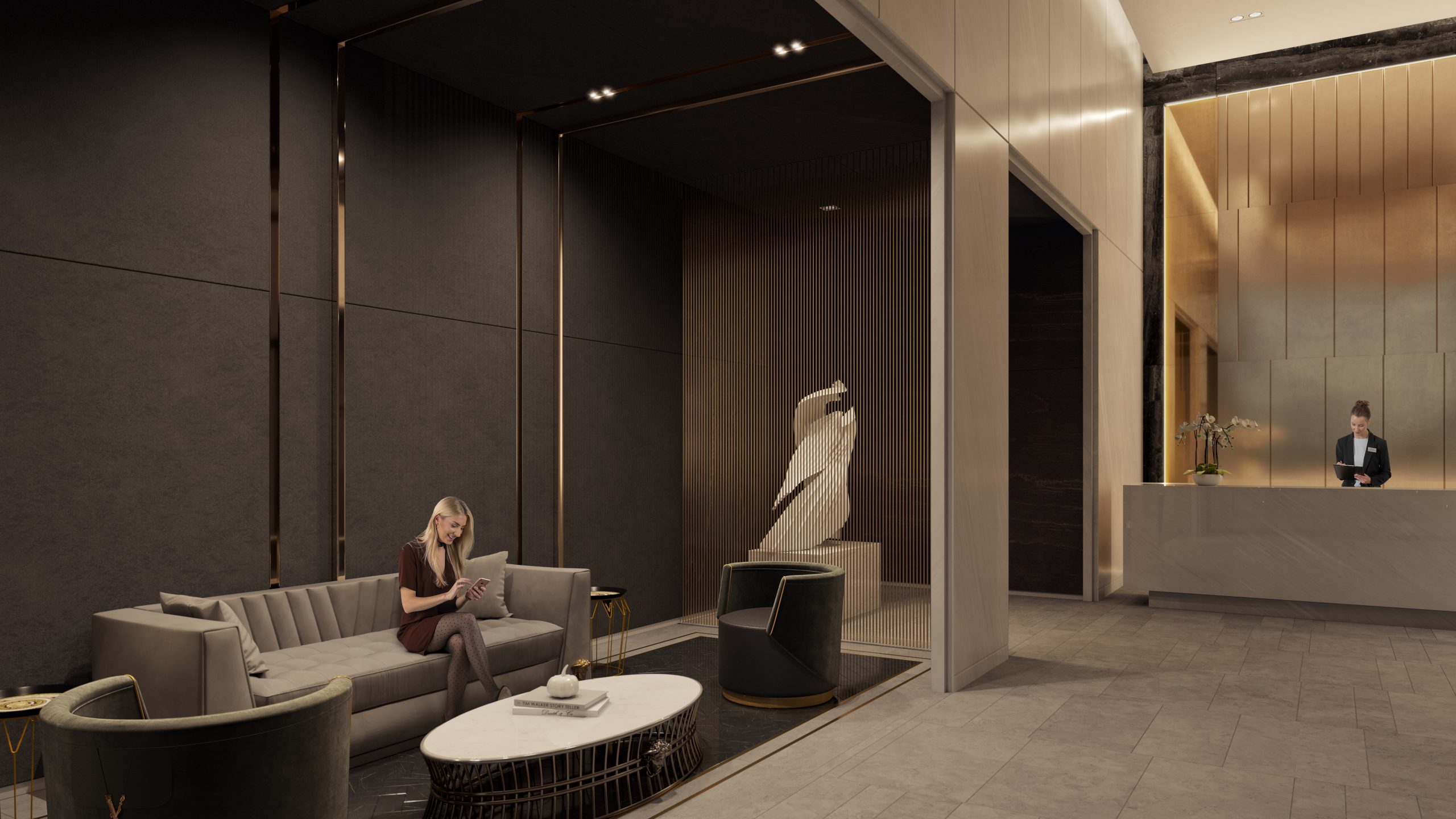 Woman seated in the lobby at the Prime Condos